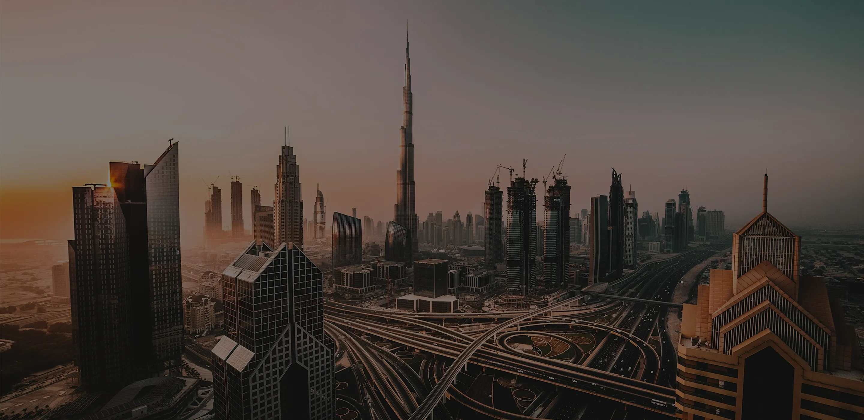 Dubai city skyline with the Burj Khalifa at dusk